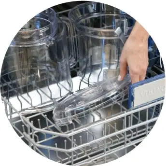 The Nutramilk parts being loaded into the dishwasher.