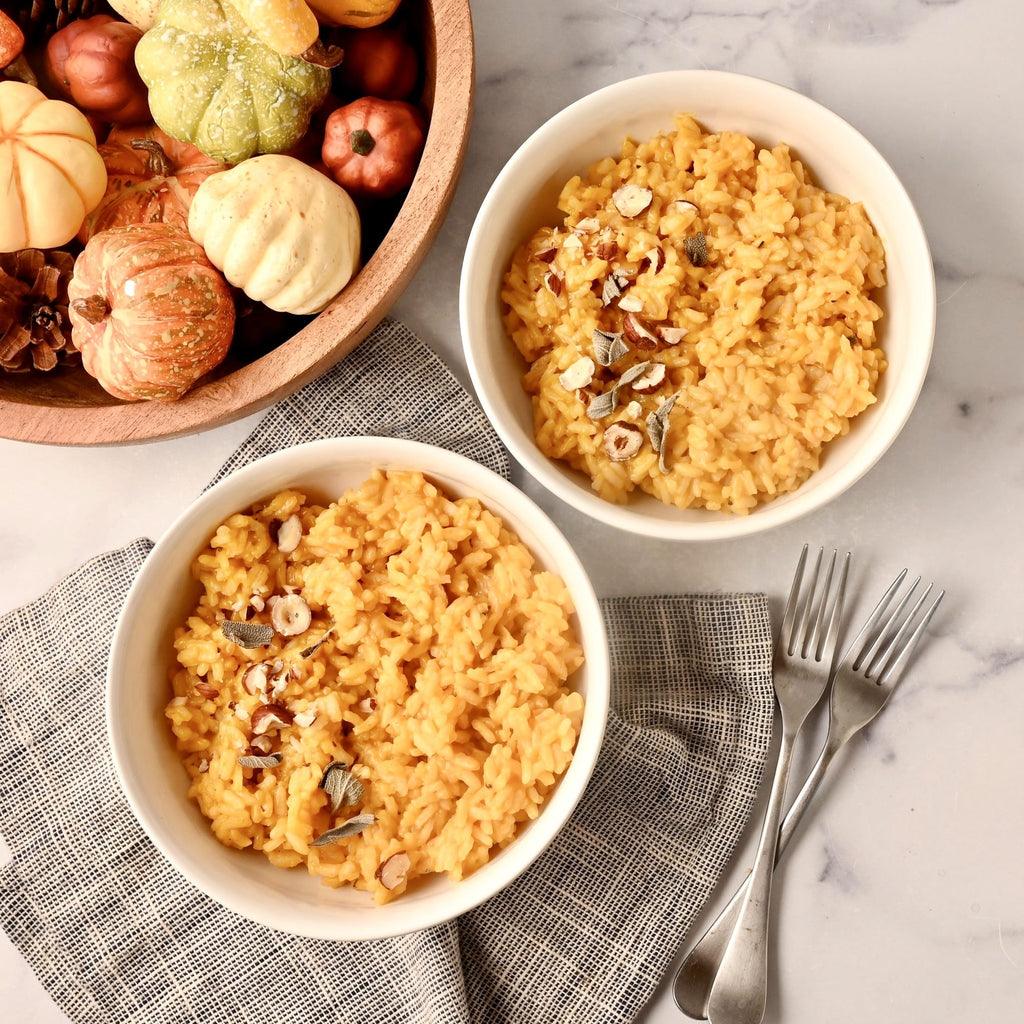 an overview of two bowls of pumpkin risotto 