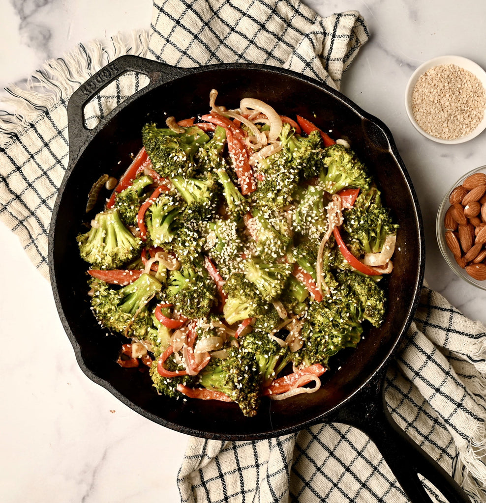 Skillet filled with sauteed broccoli